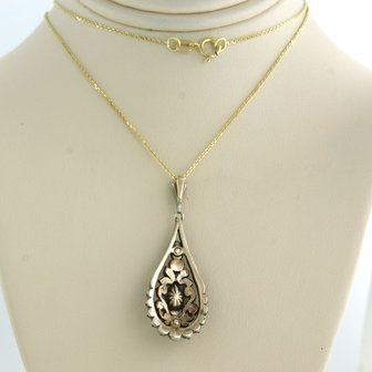 14 kt yellow gold necklace with gold and silver pendant set with diamond tot. 0.30ct