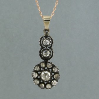 14k gold necklace with gold and silver pendant set with rose diamonds