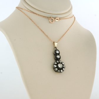 14k gold necklace with gold and silver pendant set with rose diamonds