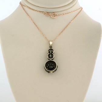 14k gold necklace with gold and silver pendant set with rose diamonds