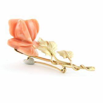 18k gold brooch with a coral rose head cut