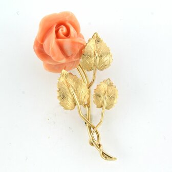 18k gold brooch with a coral rose head cut