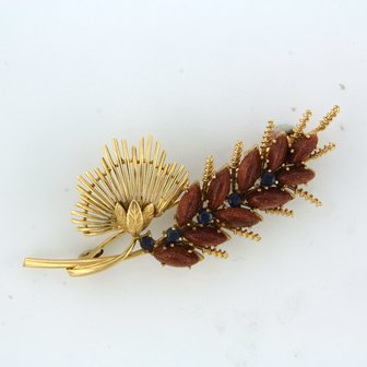 14k yellow gold brooch set with goldstone and sapphire