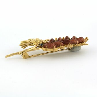 14k yellow gold brooch set with goldstone and sapphire