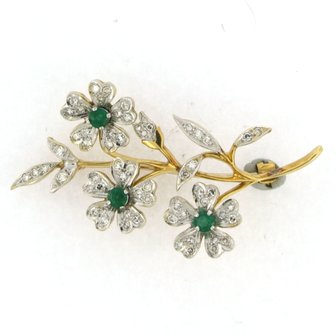 18k bicolor gold branch brooch set with emerald and single cut diamonds