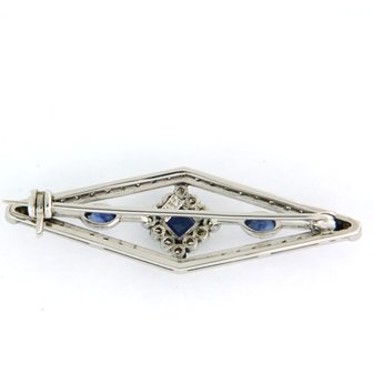 14K white gold brooch set with sapphire and single cut diamond