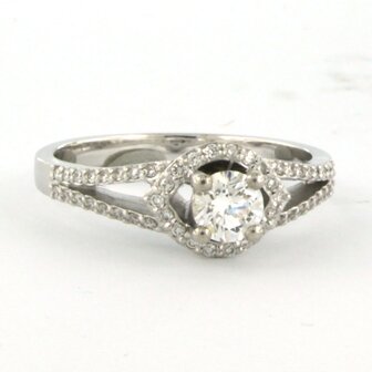 14 kt white gold ring set with brilliant cut diamonds. 0.66ct