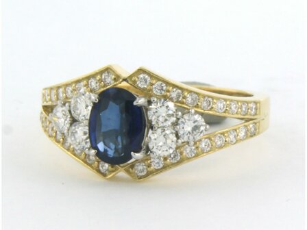 18 kt bicolor gold ring with sapphire 0.69 ct and brilliant cut diamond 0.70 ct