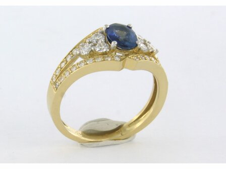 18k bicolour goud ring met centraal saffier en briljant geslepen diamant 0.64ct