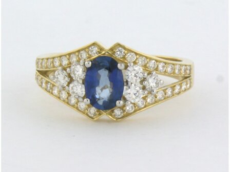 18 kt bicolour gold ring with central sapphire and brilliant cut diamond 0.64 ct