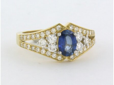 18 kt bicolour gold ring with central sapphire and brilliant cut diamond 0.64 ct