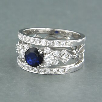 14 kt white gold ring with central sapphire and brilliant cut diamond 0.70 ct