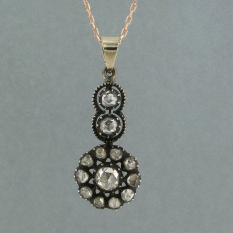 14k gold necklace with gold and silver pendant set with rose diamonds