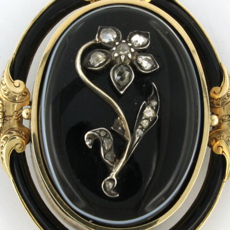 gold and silver brooch set with onyx and rose diamonds