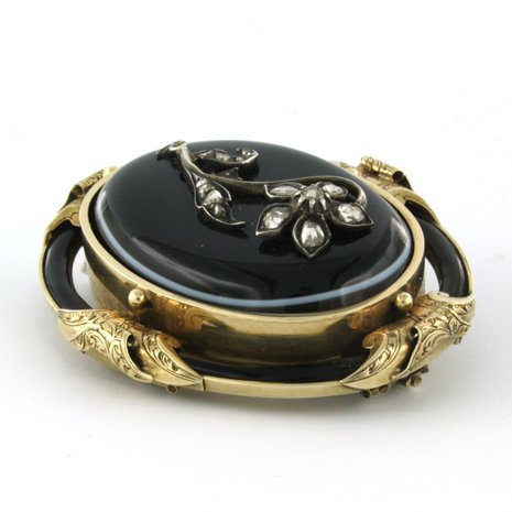 goud met zilver broche bezet met onyx en roos diamanten