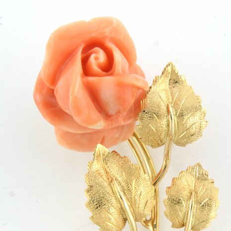 18k gold brooch with a coral rose head cut