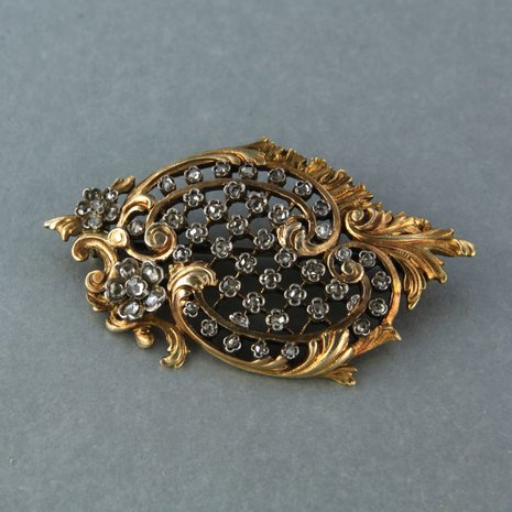 Gold and silver brooch set with rose cut diamond 0.20ct