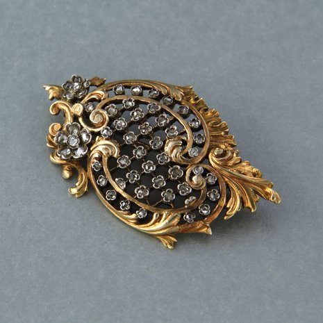 Gold and silver brooch set with rose cut diamond 0.20ct