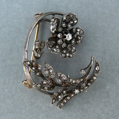 Gold and silver brooch set with diamonds