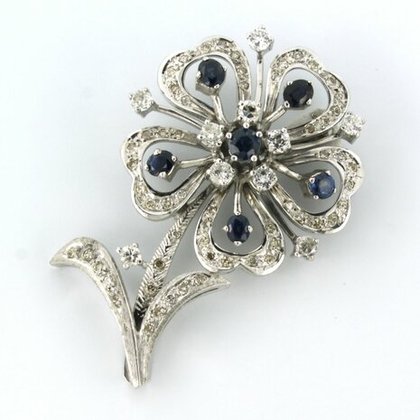 14k white gold brooch in the shape of a flower set with sapphire and brilliant cut diamonds