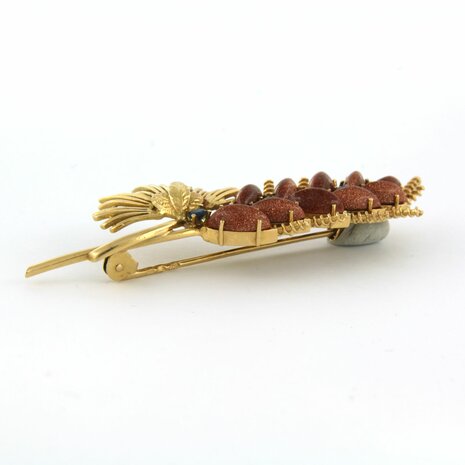 14k yellow gold brooch set with goldstone and sapphire