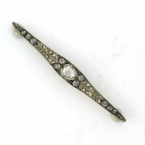 Gold and silver brooch set with rose cut diamonds. 0.60ct