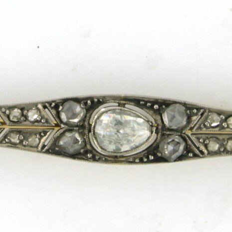 Gold and silver brooch set with rose cut diamonds. 0.60ct