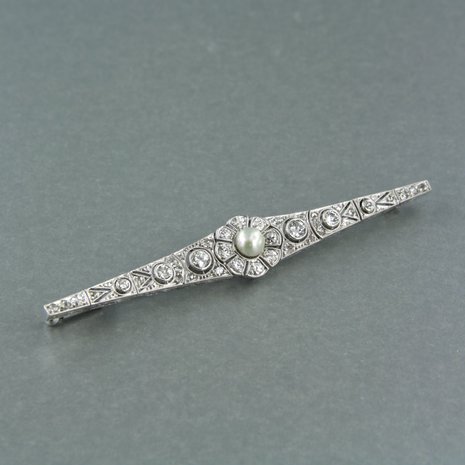 14k witgouden broche met parel en diamant 0.70 ct