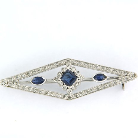 14K white gold brooch set with sapphire and single cut diamond