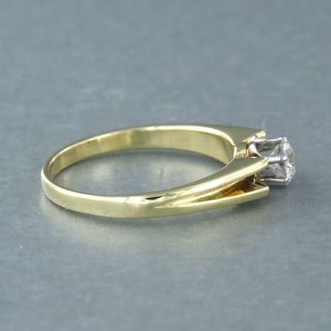 14 carat bicolor solitaire ring set with an old European cut diamond. 0.50ct 