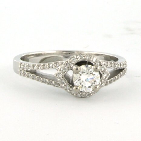 14 kt white gold ring set with brilliant cut diamonds. 0.66ct