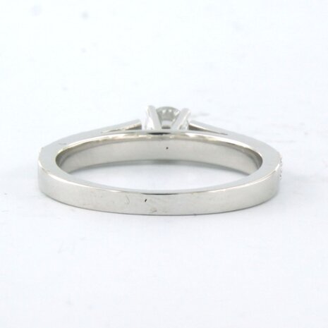 18 kt white gold ring set with a central brilliant cut diamond 0.26 ct and brilliant cut diamonds 0.12 ct