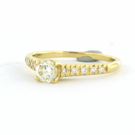 18 kt yellow gold ring set with brilliant cut diamonds 0.42 ct/0.14 ct - rm 17.5 (55)