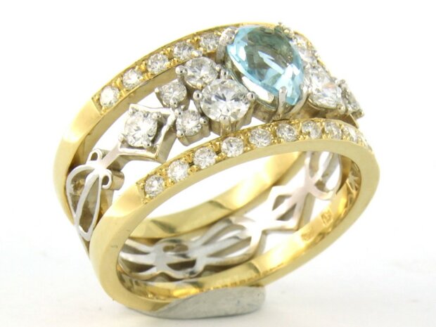 18 kt bicolour gold ring with central topaz and brilliant cut diamond 0.92 ct