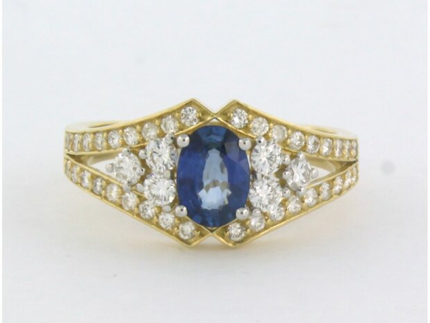 18k bicolour goud ring met centraal saffier en briljant geslepen diamant 0.64ct