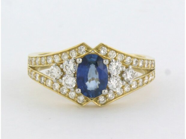 18 kt bicolour gold ring with central sapphire and brilliant cut diamond 0.64 ct