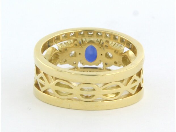 18 kt yellow gold ring with central sapphire and brilliant cut diamond 0.78 ct