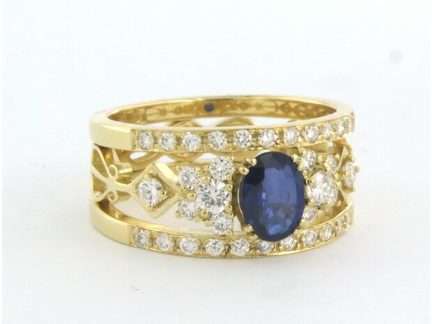 18 kt yellow gold ring with central sapphire and brilliant cut diamond 0.78 ct