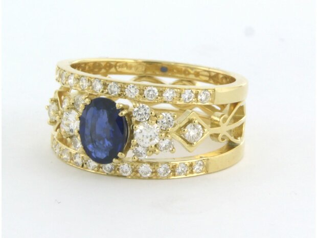 18 kt yellow gold ring with central sapphire and brilliant cut diamond 0.78 ct