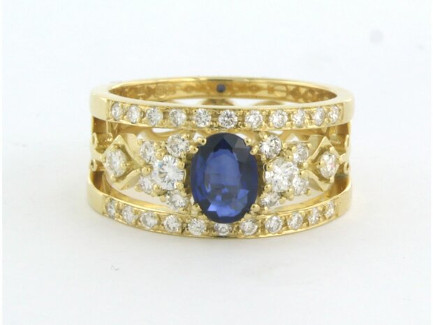 18 kt yellow gold ring with central sapphire and brilliant cut diamond 0.78 ct