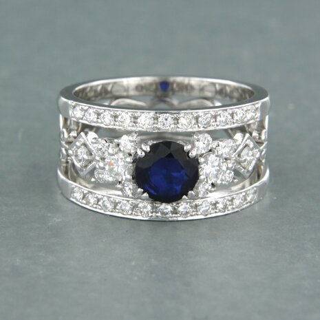 14 kt white gold ring with central sapphire and brilliant cut diamond 0.70 ct