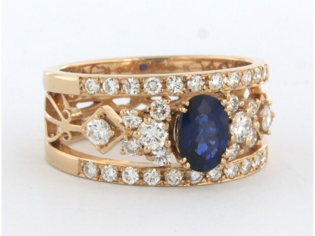 18 kt red gold ring with central sapphire and brilliant cut diamond 0.80 ct