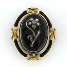 goud-met-zilver-broche-bezet-met-onyx-en-roos-diamanten
