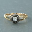 14k-geel-gouden-ring-met-Z2-zilveren-kop-bezet-met-Bolsjewiek-geslepen-diamant-tot.-0.35ct
