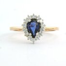 18k-bicolor-gouden-entourage-ring-met-saffier-0.65-ct-en-briljant-geslepen-diamanten-026ct