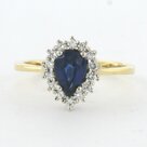18k-bicolor-gouden-entourage-ring-met-saffier-1.04-ct-en-briljant-geslepen-diamant-0.32-ct
