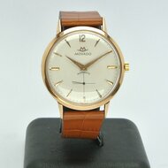 Movado-Automatic-|-18k-gold-case